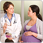 pregnant woman and doctor talking