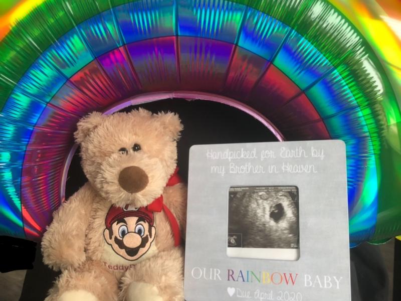 frame of ultrasound image, teddy bear and rainbow balloon