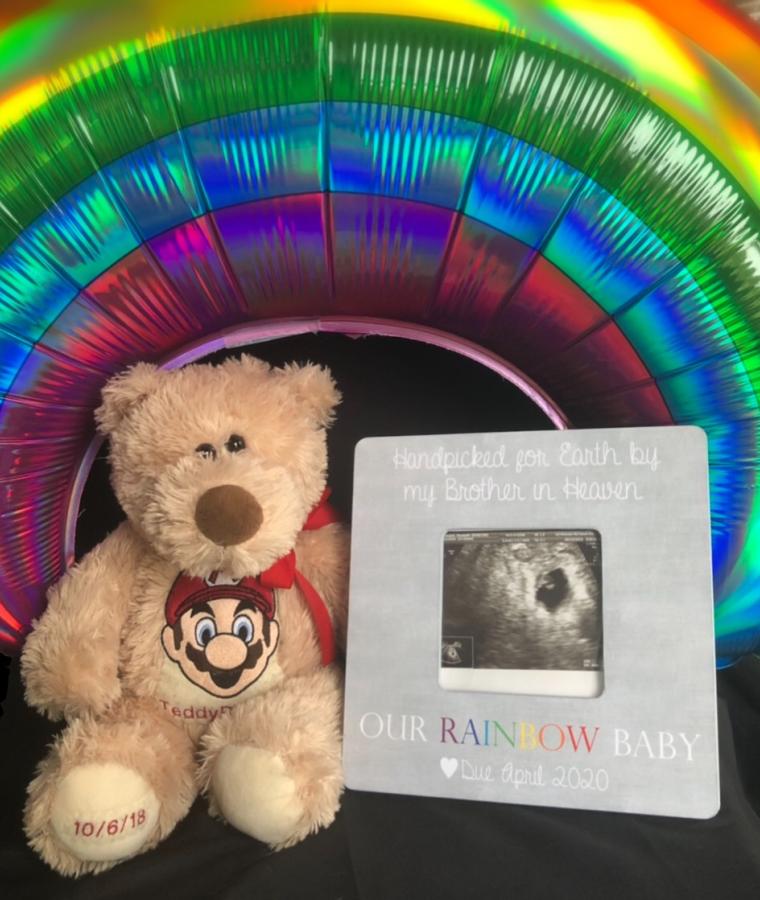frame of ultrasound image, teddy bear and rainbow balloon